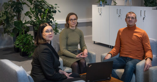 Carita, Eriikka and Jussi in the office